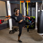 girl kickboxing at evolve fitness center new workout