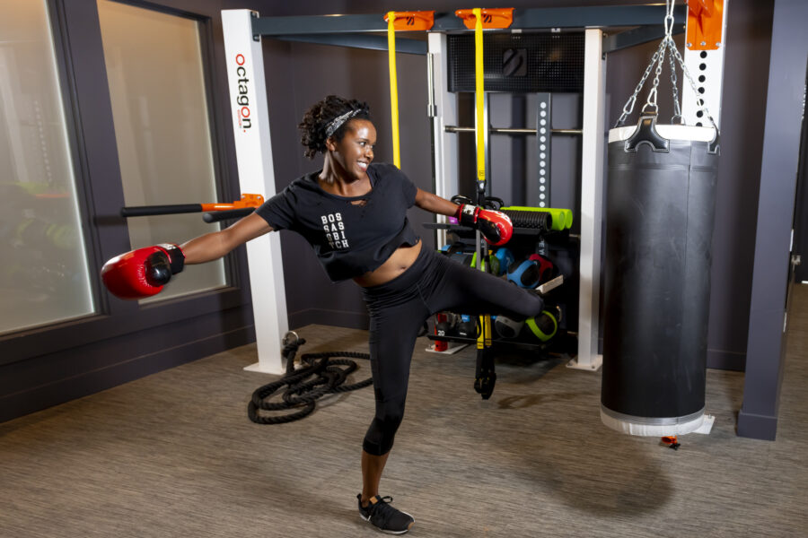 girl kickboxing at evolve fitness center new workout