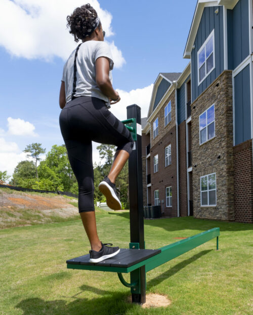 girl working out outside at evolve community new workout