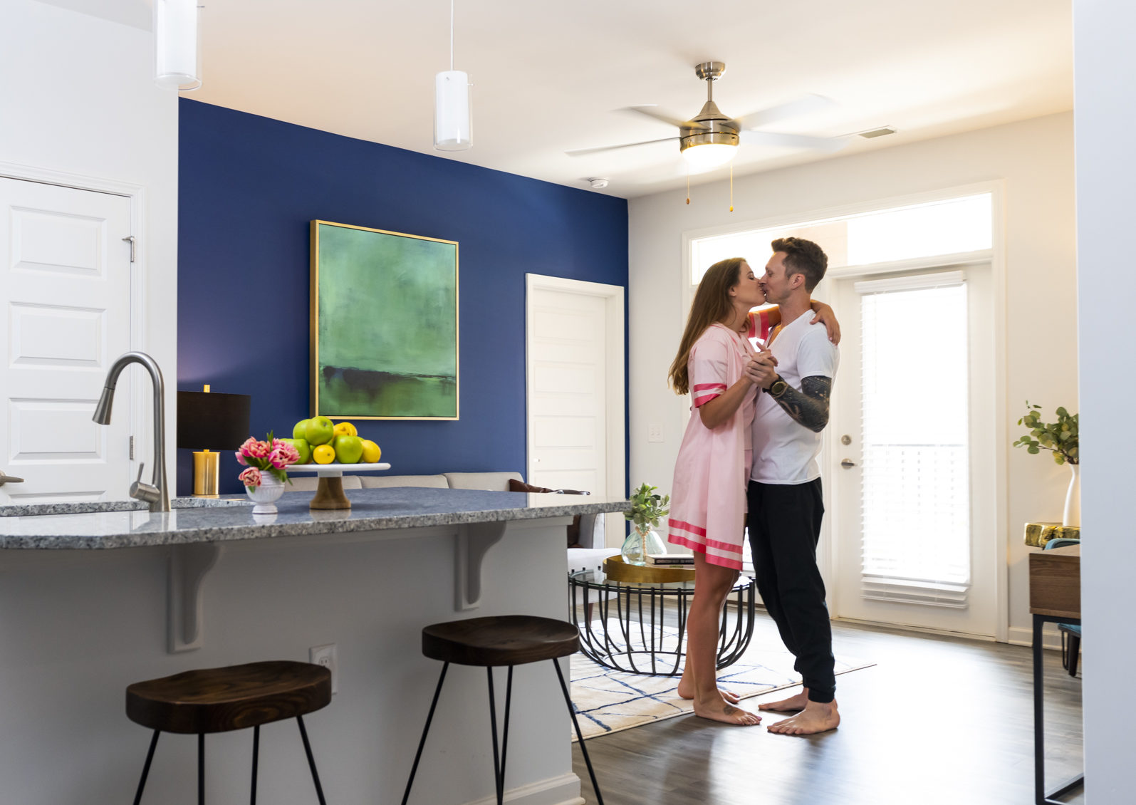 valentines-gift-ideas-evolve-companies-blog-people-kissing-and-dancing valentine's day gift ideas people dancing and kissing in living room evolve companies