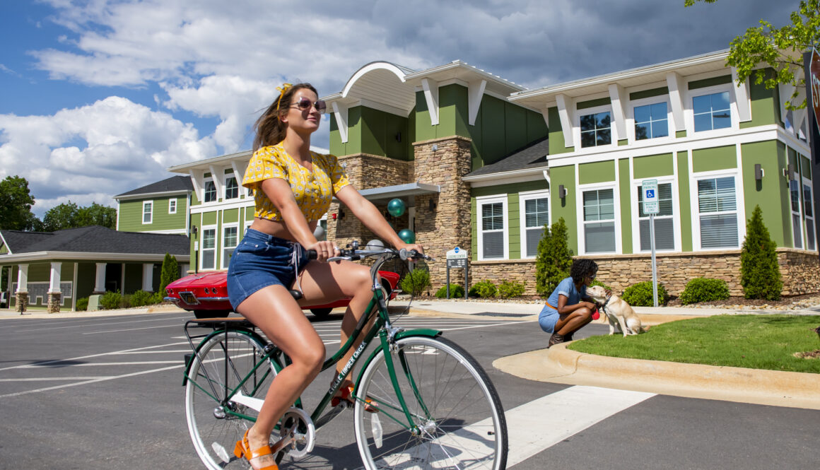 girl riding bicycle at evolve community