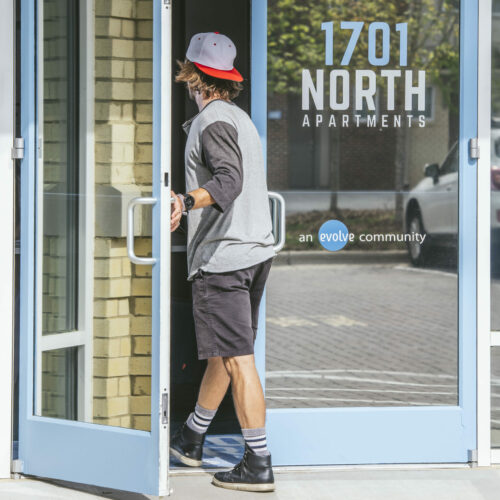 guy walking in door at 1701 north road trip spots