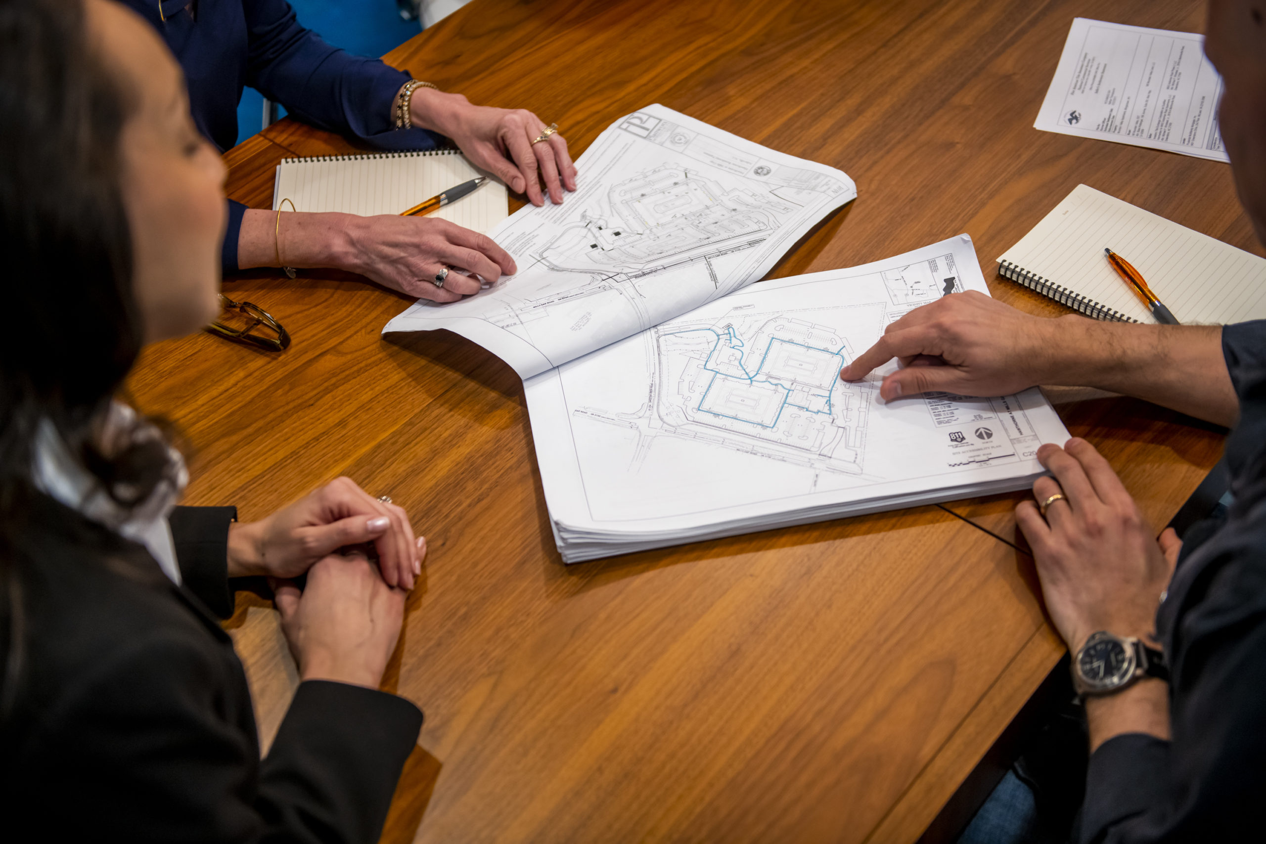 evolve-construction-blog-blueprints blueprints in conference room how we've evolved 2020