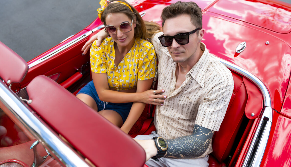 evolve staycation blog people in red convertible