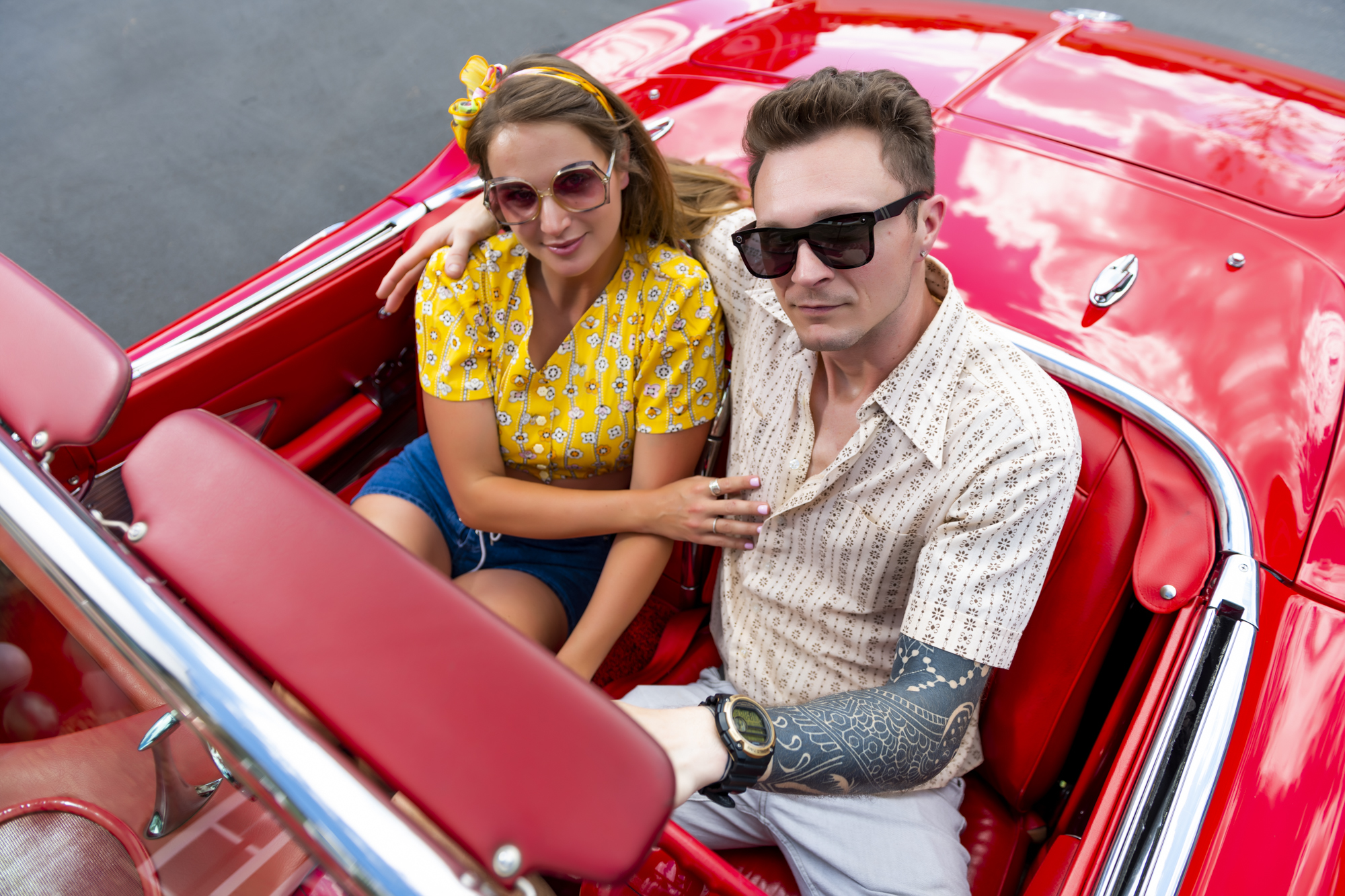 evolve-blog-staycation-in-your-city evolve staycation blog people in red convertible