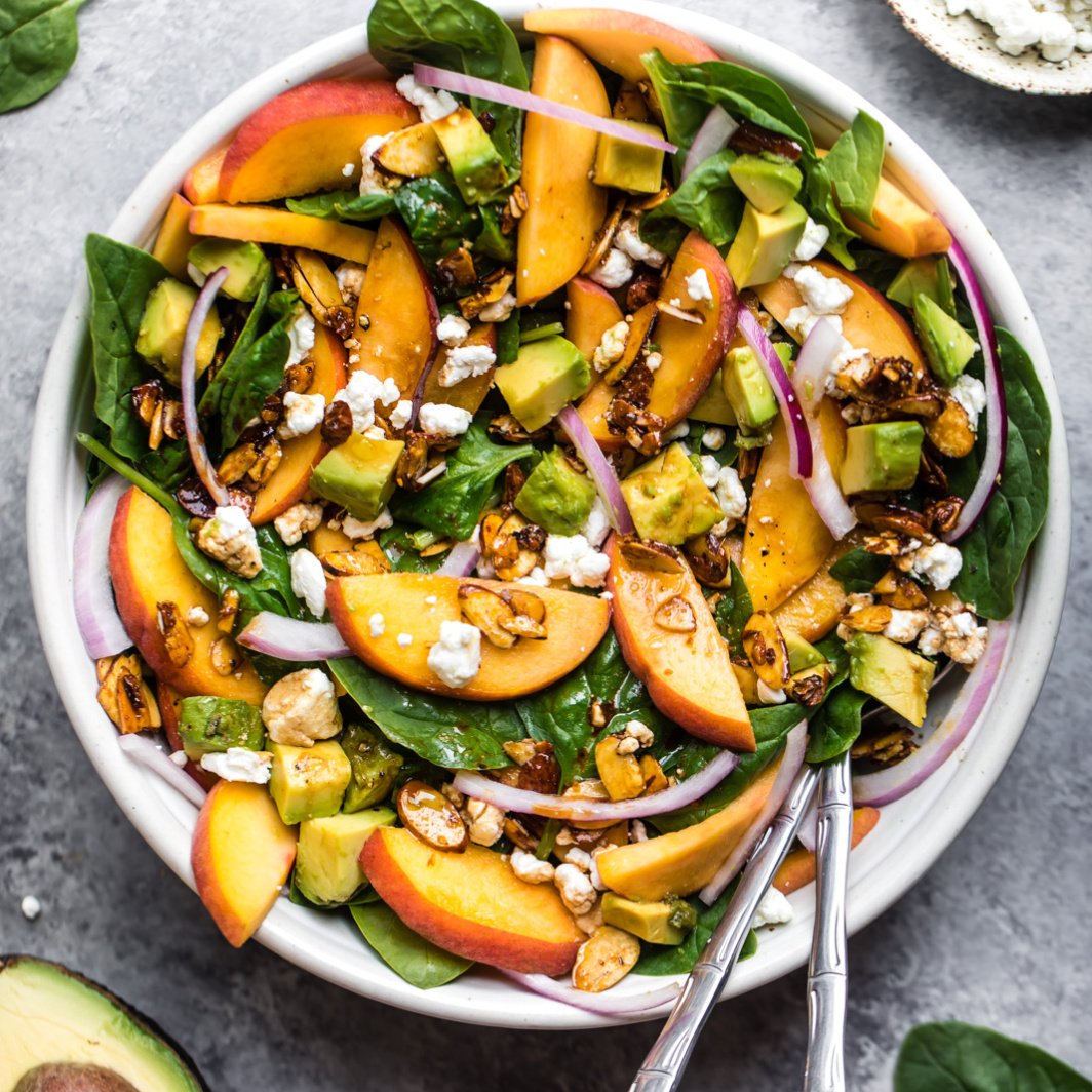 summer peach spinach salad evolve recipe