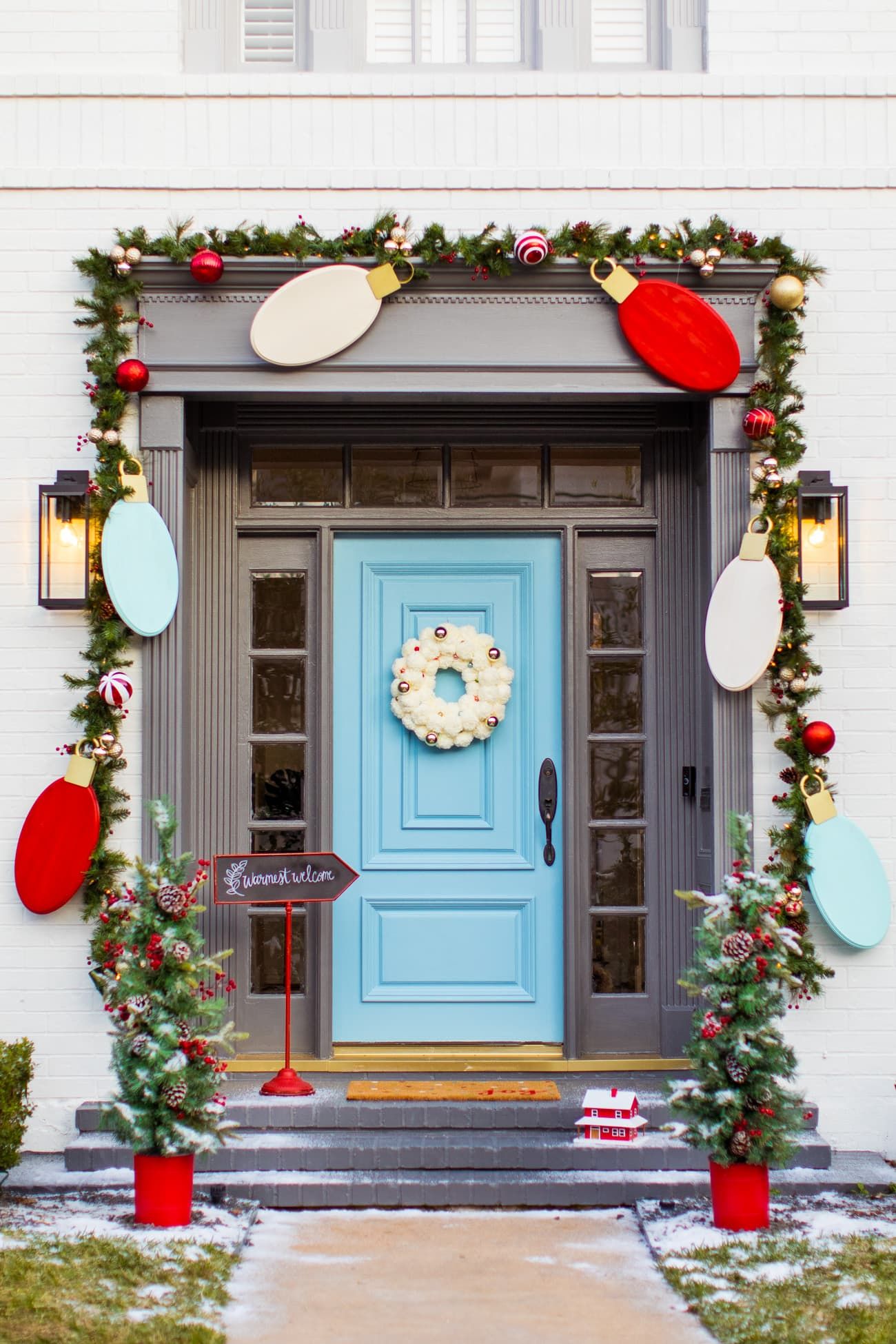 evolve-blog-deck-halls-christmas-door evolve front door garland and lights decor